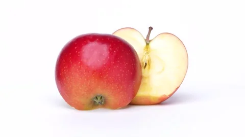 Halved Red Apple Rotating on White Background Stock-Footage 346474667