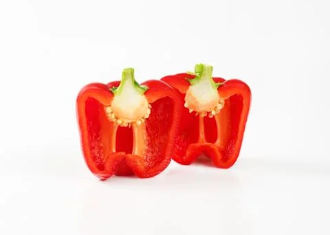 Halved red pepper Stock Photos