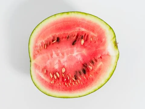 Halved watermelon on white background. Stock Photos