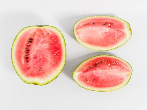 Halved watermelon on white background. Stock Photos
