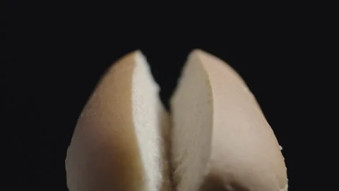 Halved white hot dog bread. Splitted long baguette for cooking. Close up. Stock Footage 161689137