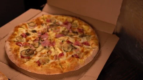 Ham and cheese and rocket and salami pizzas Stock Footage 93913045