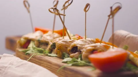 Ham and Cheese Meat Rolls on Skewers Close-Up 4K Stock Footage 動画素材 163909489