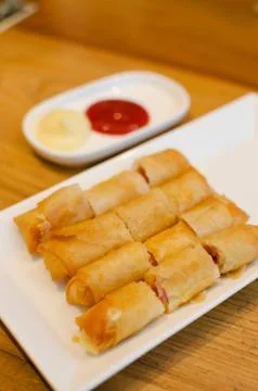 Ham and cheese spring rolls Stock Photos