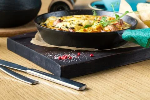 Ham and egg omelette, bio eggs, fresh herbs Stock Photos