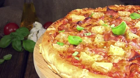 Ham and pineapple pizza (loopable) Stock Footage 42881473