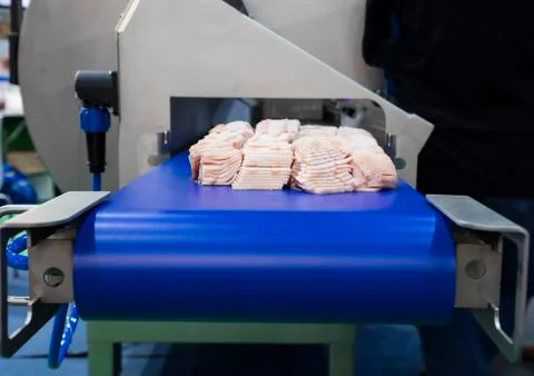 Ham on conveyor Stock Photos