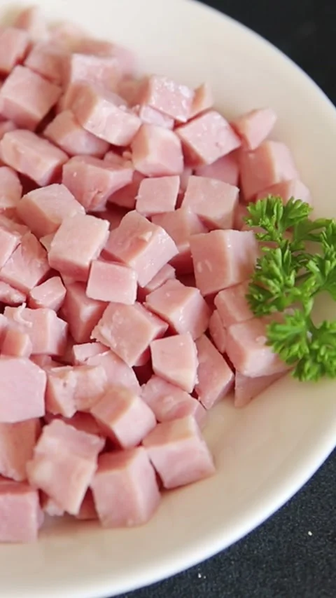 Ham cubed pork cold cuts pork meat delicious appetizer, gourmet dish table Stock Footage 344990126