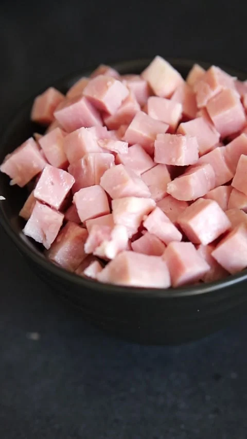 Ham cubed pork cold cuts pork meat delicious appetizer, gourmet dish table Stock Footage 344990136