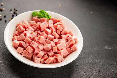 Ham cubed pork cold cuts pork meat delicious appetizer, gourmet dish table .. Stock Photos