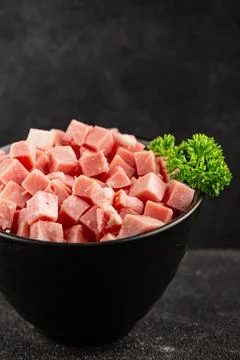 Ham cubed pork cold cuts pork meat delicious appetizer, gourmet dish table .. Stock Photos
