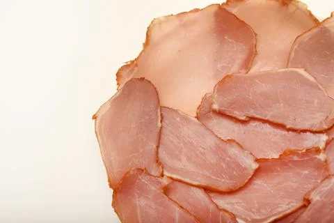 Ham cut into thin slices. Stock Photos
