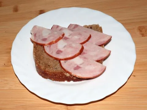 Ham on dark bread 写真素材