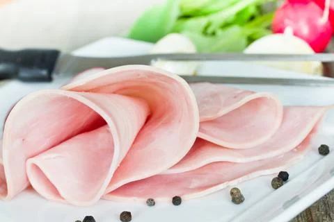 Ham on a plate Stock Photos