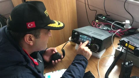 Ham radio operator communicating during an earthquake excercise Stock Footage 221579388