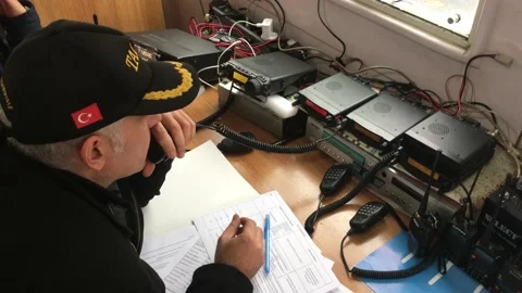 Ham radio operator communicating during an earthquake excercise Stock Footage 221579503