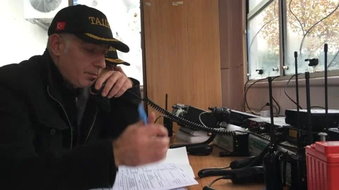 Ham radio operator communicating during an earthquake excercise Stock Footage 221579620
