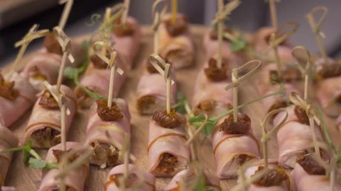 Ham rolls with cheese and sun-dried tomatoes close-up Stock Footage 314856869