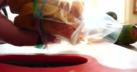 Ham sandwich being placed in sandwich bag close up lunch time Stock Footage 205801749