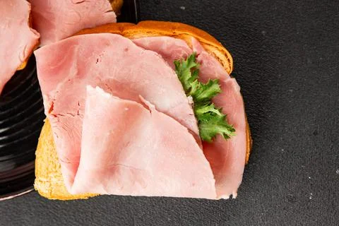 Ham sandwich slices of bread and pieces of ham fast food serving size natur.. Stock Photos