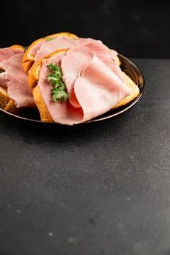 Ham sandwich slices of bread and pieces of ham fast food serving size natur.. Stock Photos