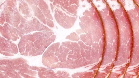 Ham sliced in thin layers, moving sideways Stock-Footage 165729725