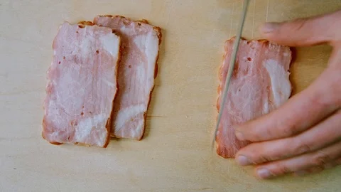 Ham sliced on a wooden Board Stock Footage 73372384