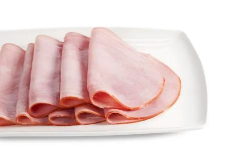 Ham slices in a plate Stock Photos