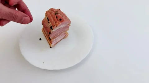 Ham Stack with Black Peppercorns on White Background 스톡 동영상 321387543