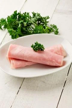 Ham on wooden table Stock Photos