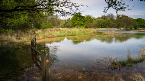 Hamble River Ebbing Tide Flooded Footbridge Time Lapse Day Pan Crane Video stock 63075108