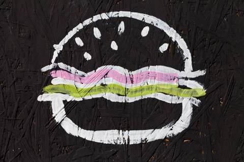 Hamburger and cheeseburger, abstract pattern on a black background Stock Photos