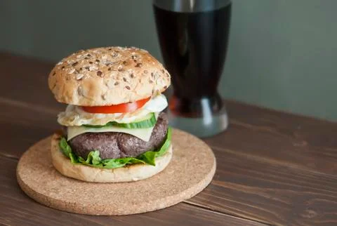 Hamburger and cola Stock Photos