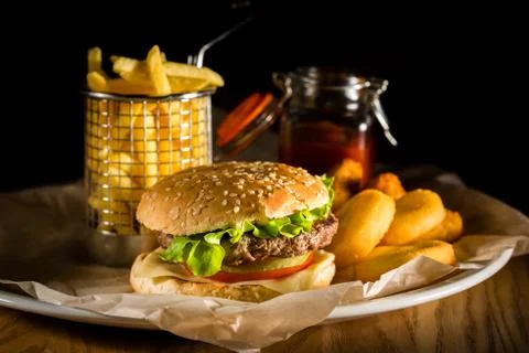 Hamburger and french fries Stock Photos