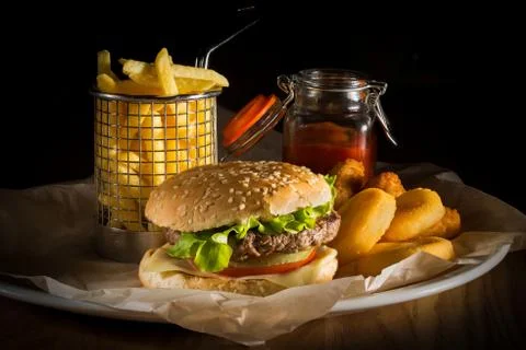 Hamburger and french fries Stock Photos