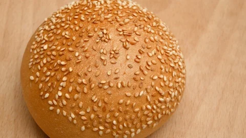 Hamburger buns on the table. Stock Footage 107619988