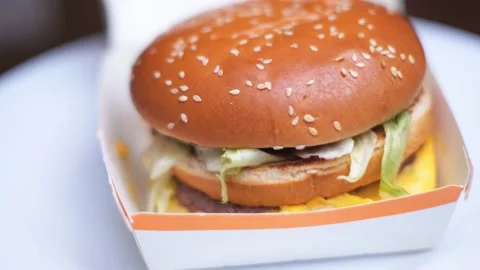 Hamburger close-up rotates in a circle Stock Footage 226806623