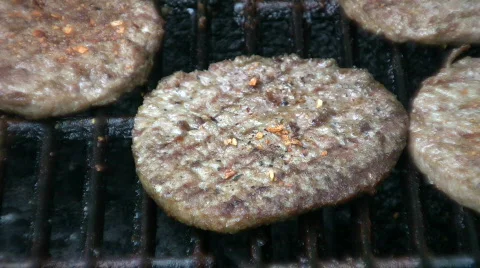 Hamburger cooking on grill closeup Stock Footage 474653