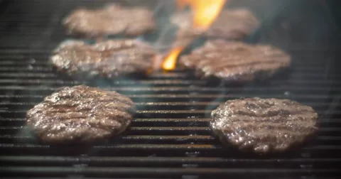 Hamburger Cooking on the Grill Stock Footage 62872459