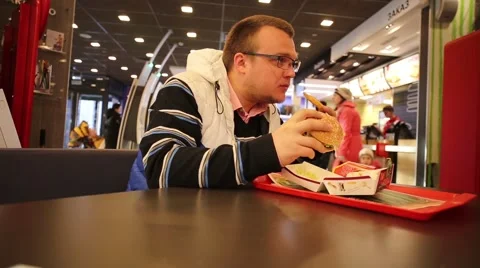 Hamburger Eater Stock Footage 53025240