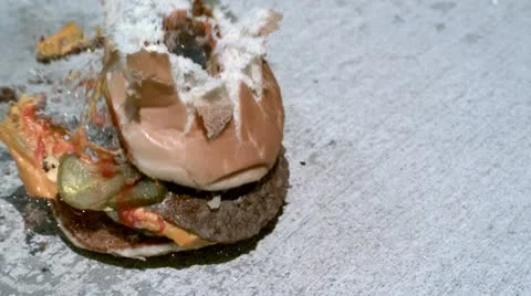 Hamburger Exploding into pieces Stock-Footage 12617489