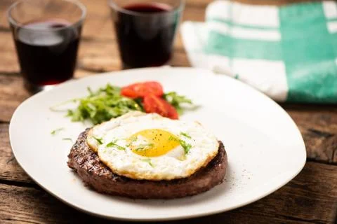 Hamburger with fried egg closeup Stock Photos