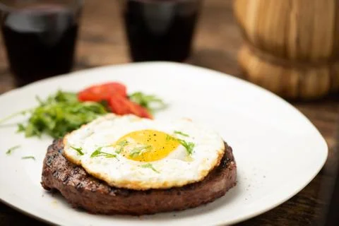 Hamburger with fried egg closeup Stock Photos