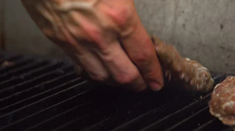 A hamburger on the grill Stock Footage 66692503