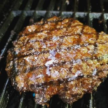 Hamburger grilling Stock Photos