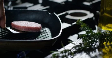 Hamburger Leaned On Warm Grill 4k Stock Footage 85836044