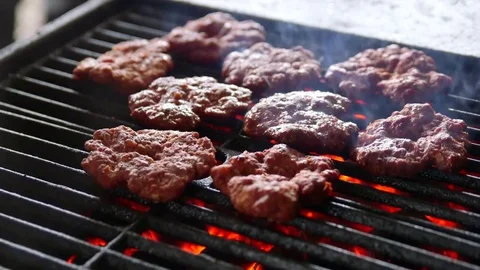 Hamburger meat on grill Stock Footage 78265135