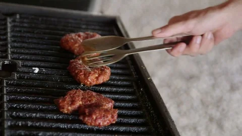 Hamburger meat on grill Stock Footage 78265196