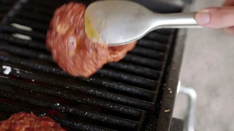 Hamburger meat on grill Stock Footage 78265256