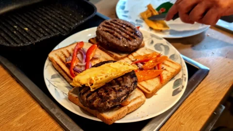 Hamburger prepared with toasted bread Stock Footage 295995765